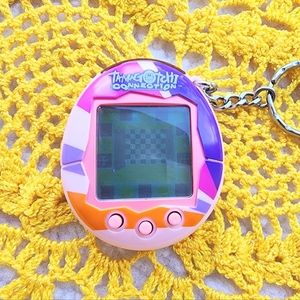 Tamagotchi Connection V2 2005 Pink w/ Geometric Pattern
